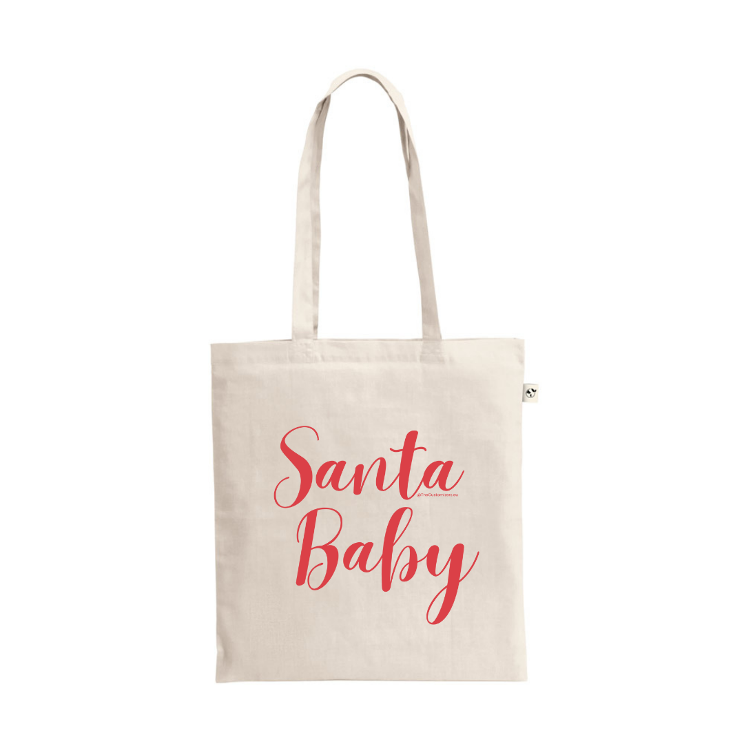 A natural cotton tote bag with the popular holiday song lyric "Santa Baby" printed in a large, elegant red script.