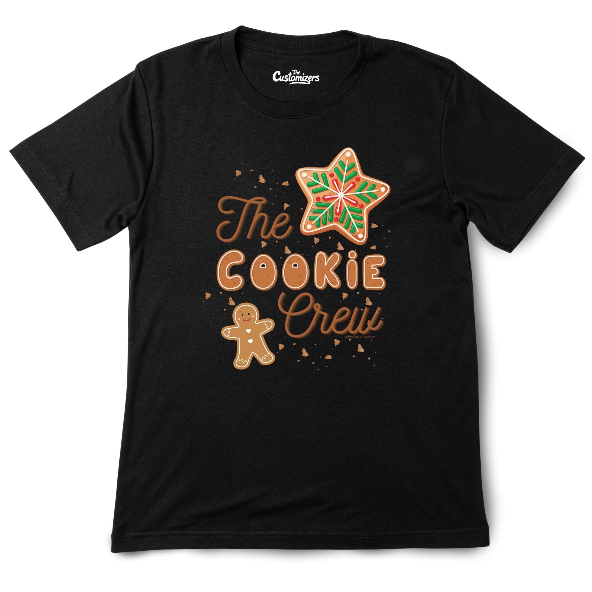 Black T-shirt with a festive design featuring the phrase “The Cookie Crew” in gingerbread-style lettering, decorated with a gingerbread man and a star-shaped cookie with green and red icing.