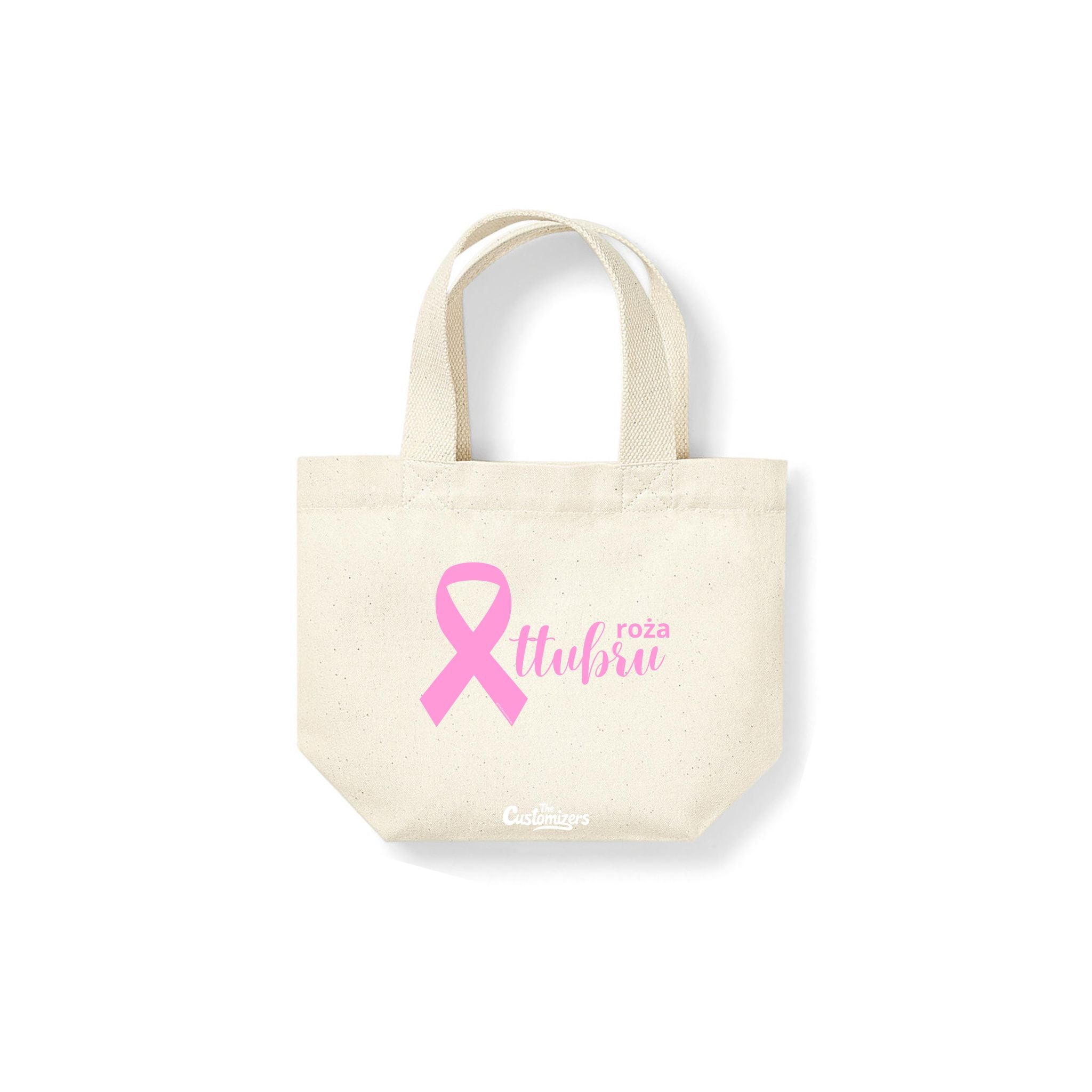 Beige mini tote bag with pink breast cancer awareness ribbon and Maltese text 'Ottubru Roża' supporting Pink October – by The Customizers.